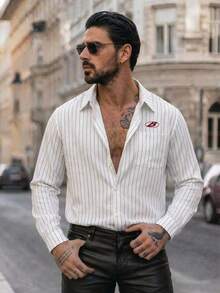 Manfinity VCAY 男士刺绣条纹长袖单排扣休闲口袋衬衫 条纹男士休闲翻领衬衫 男士复古衬衫 男士条纹衬衫 长袖衬衫 条纹男士长袖衬衫 男士休闲衬衫 复古服装 男士街头服饰 男士衬衫 男士复古服装 - 彩色 - 查看 2