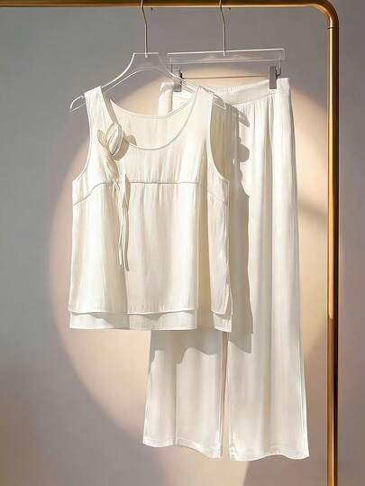 GlowEve CURVE 大码女装夏季时尚，优雅精致，修身无袖上衣饰有 3D 立体花卉细节，搭配阔腿裤，时尚两件套，通勤必备。