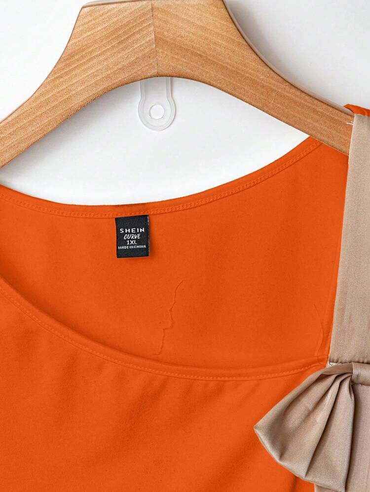 GlowEve CURVE Camiseta de manga corta con lazo y decoración de color contrastante para mujer talla grande - Naranja - Añade 4