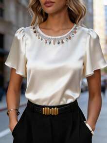 SHEIN Áo sơ mi nữ cổ tròn tay ngắn màu trắng satin, cổ bèo kiểu dáng nghỉ lễ, tay phồng, kiểu dáng thường ngày đa năng, chất liệu satin mềm mại, rủ tự nhiên, tối giản nhưng sang trọng, phù hợp cho đi làm mùa xuân/hè, mặc hàng ngày, mùa đông, dự tiệc, đi biển, hẹn hò, lễ tốt nghiệp, công sở, đồng phục giáo viên thành thị, Giáng sinh và năm mới, áo sơ mi trắng thanh lịch, áo satin đính ngọc trai, áo sơ mi satin cho nữ, áo đính ngọc trai nữ, áo cho nữ thanh lịch, áo sang trọng, áo trắng nữ, áo và áo sơ mi nữ, áo công sở, trang phục công sở nữ, quần áo công sở nữ, áo sơ mi nữ thanh lịch, áo công sở nữ sang trọng, áo mới nhất cho nữ. - trắng - Xem 1