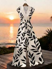 GlowEve Nuevo mono informal y elegante para vacaciones, fiestas en la playa con cuello halter, estampado de agua y lazo en la cintura para mujeres, primavera/verano - Multicolor - Ver 3