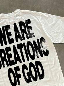 Manfinity Dauomo 这款Y2K街头风宗教主题T恤，印有醒目的“我们是上帝的造物”字样。这款加大码男士T恤版型休闲舒适，无论是日常外出还是居家休闲，都是男士的理想之选。其趣味十足的图案设计更添独特个性魅力。 - 彩色 - 查看 3