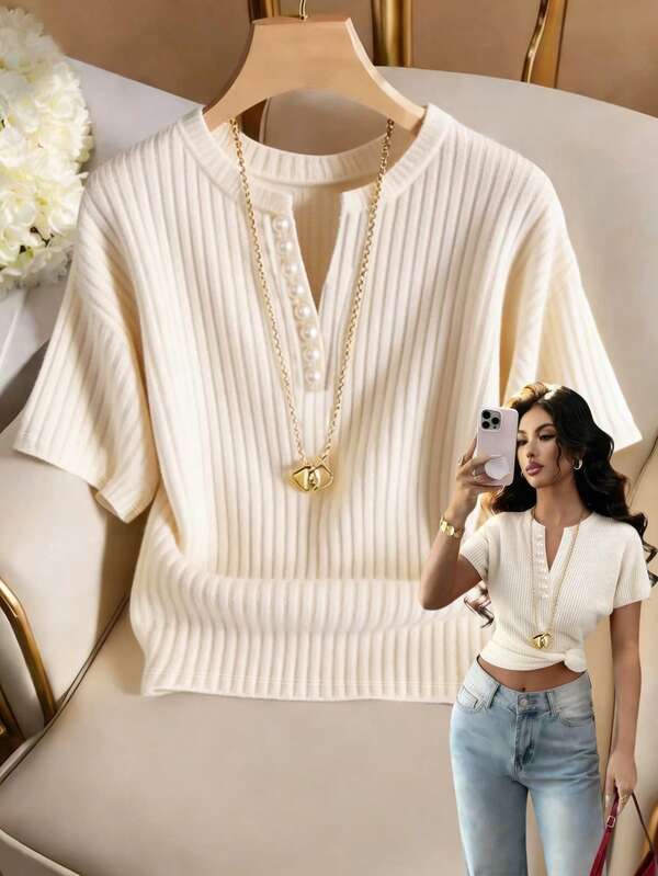 Franclia Women's Off-White T-Shirt With A Round Neck, V-Neck, Half-Open Placket, Pearl Embellishments, Short Sleeves, And Loose Fit, Made Of Cloud-Feel Quilted Fabric. Pair It With A Delicate Pearl-Embellished, Loose-Fitting Short-Sleeved Knit Top, Summer Knit Top, Women's Clothing, Off-White Top, Off-White Shirt, Apricot Women's Shirt, Party Top, Women's Beachwear, Women's Casual Top, Women's Vacation Wear, Summer Holiday Wear, Women's Commuting Wear, Summer Top, Women's Spring Wear, Women's Winter Top, Inner Layer Top, Off-White T-Shirt.Graduation Season Attire, Fashionable Casual Commuter Wear, Business Office Wear, Versatile And Stylish Everyday Casual Wear, Urban Teacher's Professional Attire