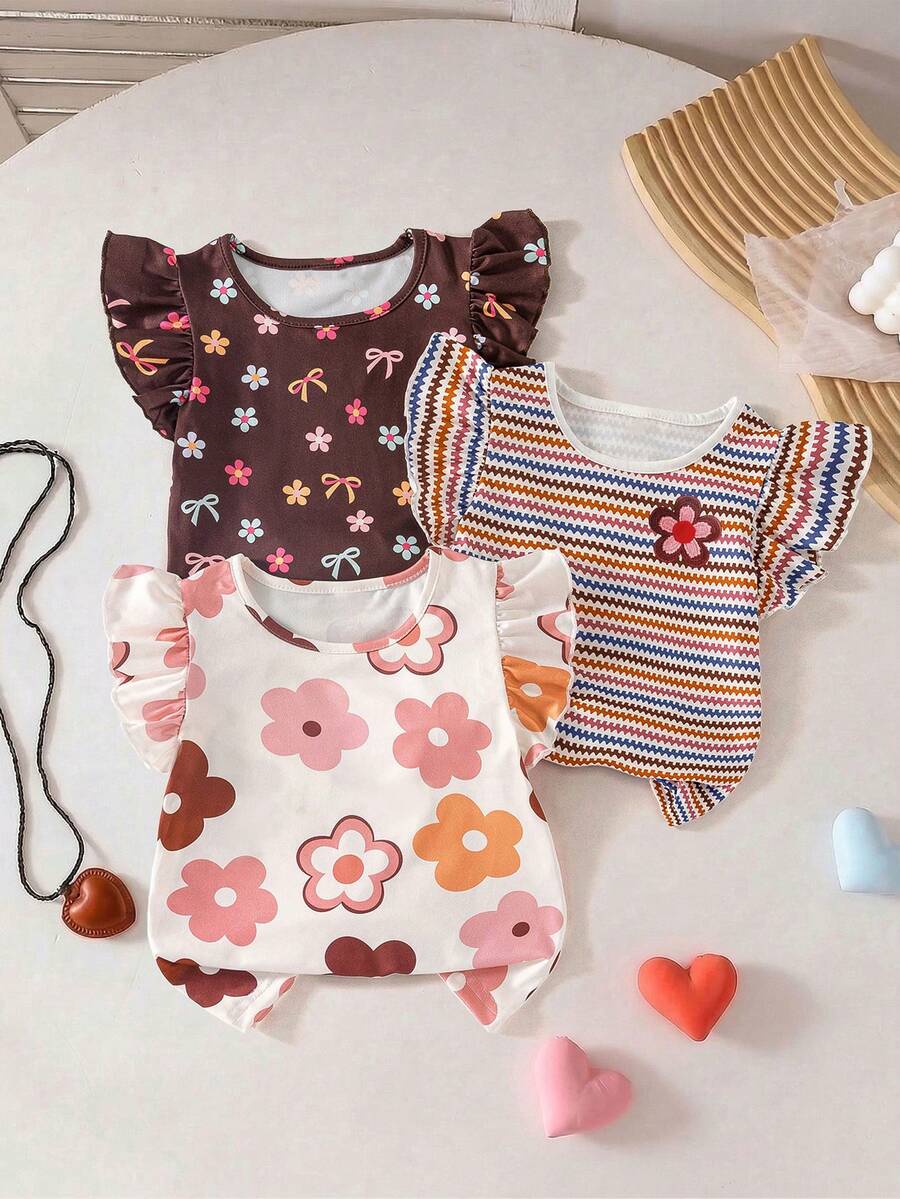 SHEIN GraphicGems 3件套女童可爱多巴胺花卉系列,包括:白色圆领短泡泡袖T恤,彩色多巴胺条纹棕色T恤,百搭休闲舒适,适合春季、夏季、假期、日常穿着,时尚花卉条纹图案,轻盈宽松。 - 玫紅色 - 查看 1