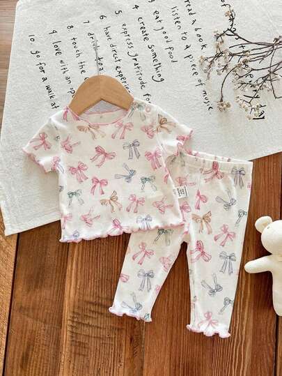 SHEIN LMoss Kids Dozemod Kids Newborn Baby Girl Cute Cartoon Pattern Ruffle Trim Round Neck Short Sleeve Knit Soft Pajama Set, 2pcs