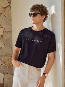 Manfinity CityGents 男士休閒文字印花短袖圓領 T 卹 - 黑色 - 查看 1