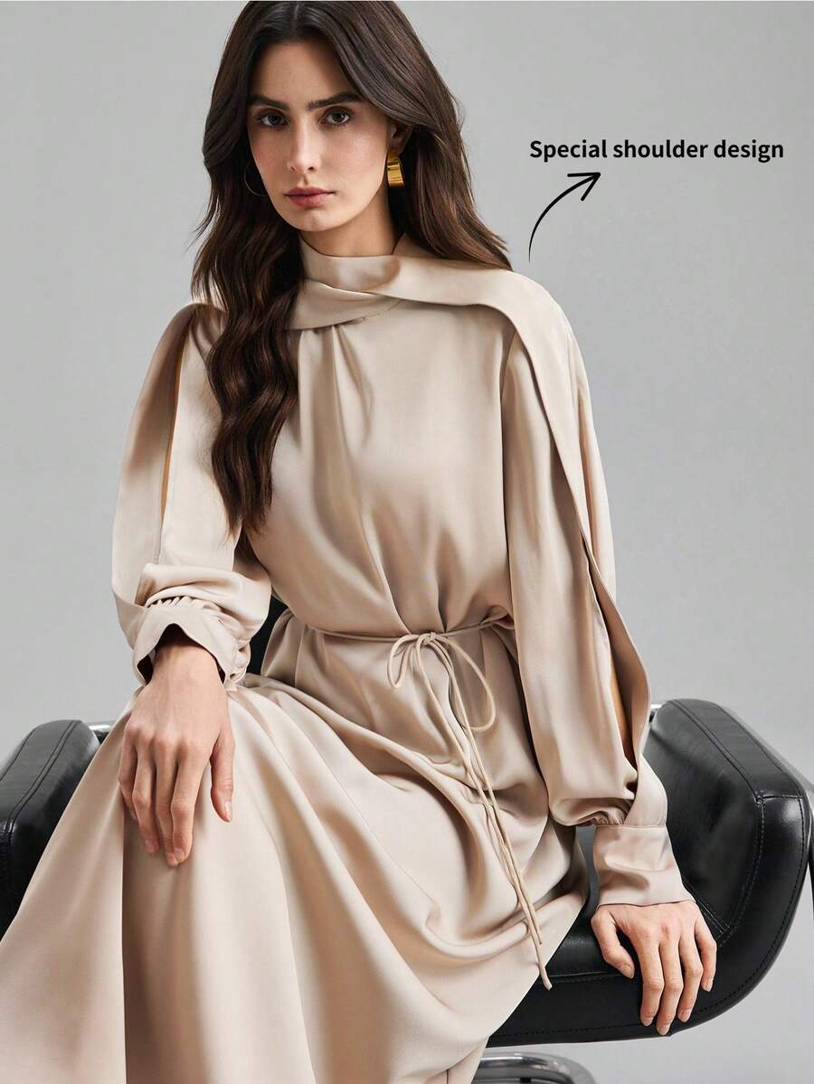 Ontre Đầm dài nữ Xuân/Hè 2026SS, Đầm dài nữ cho mùa Xuân/Hè, Trang phục đi nghỉ mát, Trang phục hẹn hò lãng mạn, Kỳ nghỉ, Chất liệu Satin, Màu be, Màu kaki, Cổ đứng nhỏ, Chi tiết thiết kế, Tay dài, Màu be, Dáng rộng, Phong cách công sở tối giản, Chi tiết thiết kế, Thanh lịch tối giản, Tiệc trà, Dáng chữ A thắt eo, Đầm dài thời trang đa năng bán chạy nhất - Màu be - Xem 1