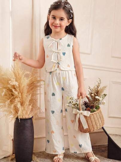 SHEIN LMoss Kids 女童爱心荷叶边无袖蝴蝶结上衣和七分裤两件套，适合外出和度假