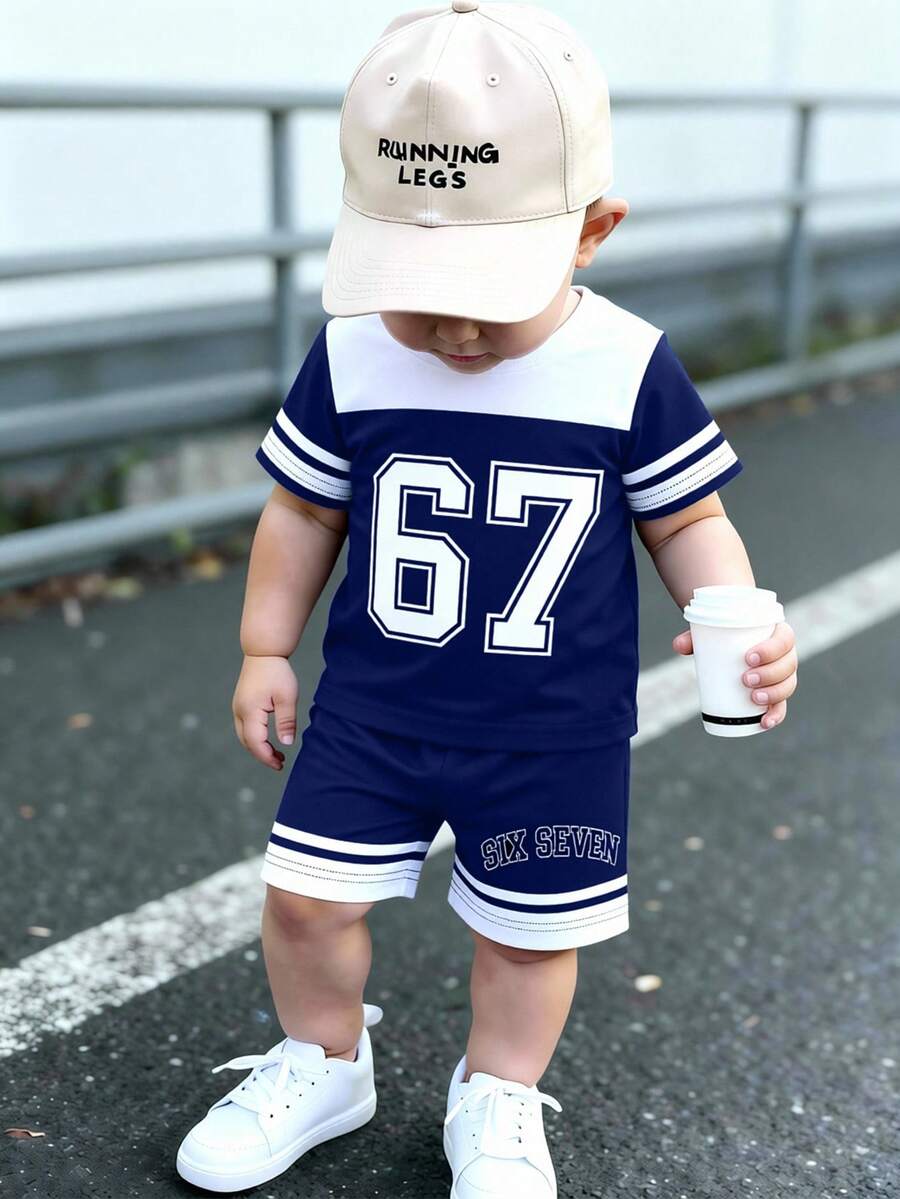 两件套男婴套装,时尚运动风条纹67 SIX SEVEN印花圆领短袖T恤搭配简约英文印花藏蓝色短裤,适合夏季外出穿着。 - 彩色 - 查看 1