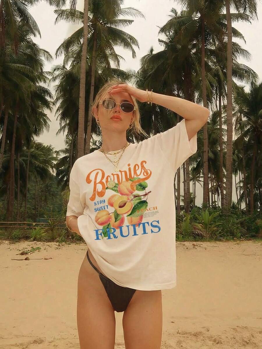 Aloruh 宽松休闲极简热带水果桃子印花圆领短袖T恤，法式里维埃拉度假图案T恤，海滩度假装扮，女士夏季穿搭，夏季女士T恤，沙滩T恤，女士T恤，海滩风穿搭 - 杏色 - 查看 1