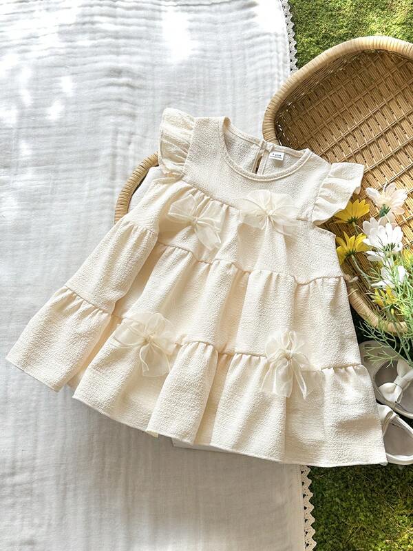 SHEIN Vintaside Kids Đầm denim cho bé gái với họa tiết hoa 3D, kiểu dáng dễ thương và thời trang, phù hợp cho mùa xuân/hè.