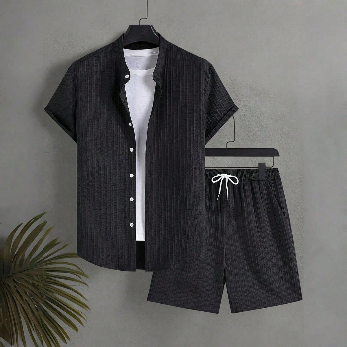 Conjunto de camisa de manga corta con botones delanteros y pantalones cortos de verano casual