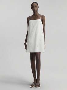 Ontre 2025新款宽松A字白色连衣裙，舒适休闲风格，珍珠装饰，短款吊带裙，适合海滩、度假、波西米亚风、夏季音乐节、西式风格等场合，高品质面料 - 白色 - 查看 4