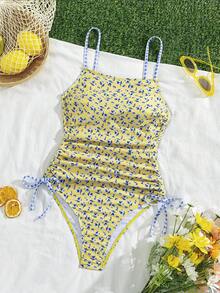 Swim Mod 女士连体泳衣，适合夏季海滩和休闲度假——温柔、复古、甜美又浪漫。采用双印花设计：小碎花图案搭配格子图案。侧边抽绳设计，露背剪裁，修身显瘦。是海滩、海边出游的理想之选；也是女士春秋季泳装的完美之选。 - 彩色 - 查看 9