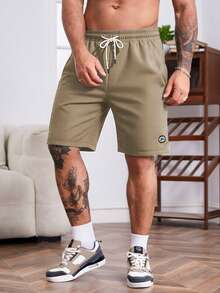 Genlund Pantaloncini casual da uomo con coulisse in vita, tasche inclinate e texture a nido d'ape di colore unito - Cammello - Visualizzare 1
