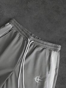 SLATEMANN Bộ đồ nam thường ngày gồm áo thun ngắn tay cổ tròn phối màu tương phản và quần short cạp chun, thích hợp cho mùa hè. - Nhiều màu - Xem 3
