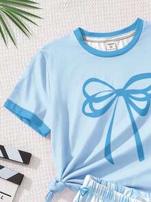 Bộ quần áo 2 mảnh cho bé gái tuổi teen, gồm áo ngắn tay và quần short in họa tiết kẻ caro xanh dương, kiểu dáng tối giản, thích hợp cho mùa hè. - Nhiều màu - Xem 4