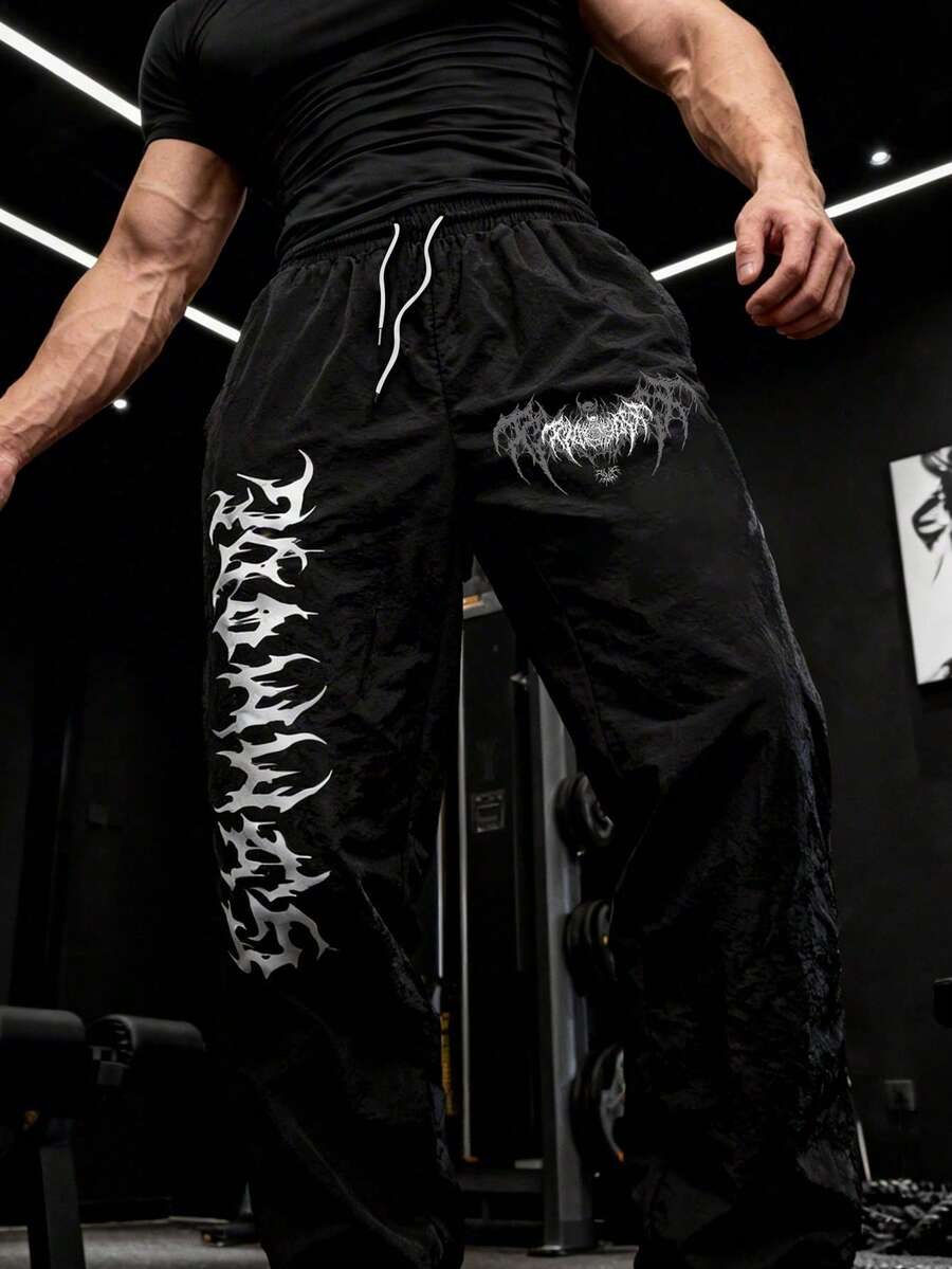 GymBeat Men's Elastic Waist Drawstring Fashionable Printed Loose Casual Sports Pants - Black - View 1