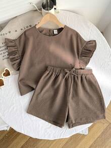 Bộ đồ thời trang cho bé gái tuổi teen mùa xuân/hè mới, kiểu dáng thường ngày, mềm mại, thoải mái, màu nâu cà phê, cổ tròn, tay phồng, có họa tiết nhún bèo, kết hợp với quần short viền bèo nhún, thích hợp cho kỳ nghỉ và đi biển. - Cà phê nâu - Xem 5
