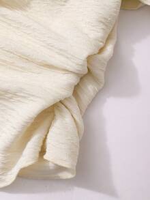 Bộ đồ 2 mảnh thanh lịch và dịu dàng dành cho bé gái tuổi teen, gồm áo trễ vai xếp ly bất đối xứng và chân váy xếp ly hai lớp, thích hợp cho các buổi đi chơi và tụ họp thường ngày, mùa xuân/hè. - Màu be - Xem 4