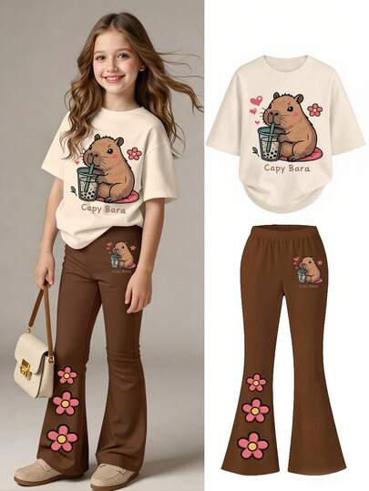 Set de 2 piezas de camiseta y pantalones acampanados de moda casual para niñas preadolescentes, con estampado de una rata de agua bebiendo boba tea, estampado de corazón y flor, pantalones largos con estampado de letras y camiseta de manga corta, tela elástica y suave, diseño de dibujos animados lindos, estilo de pantalones acampanados, adecuado para primavera/verano/otoño, ropa de 2 piezas para niñas de 11 años para la escuela, al aire libre, casual, fiesta, regalo