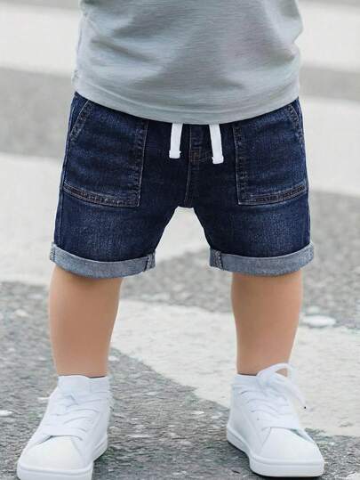 SHEIN Pantalones cortos vaqueros ajustados de denim azul oscuro para niño