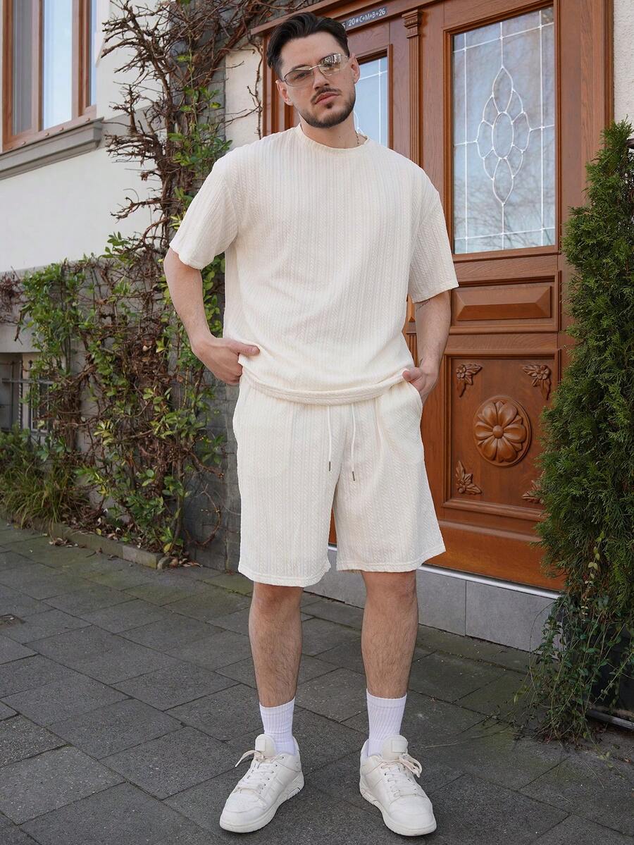 LEOGASHI LEOGASHI Conjunto casual de vacaciones para hombre con camisa de manga corta y shorts florales de felpa naranja de primavera/verano, inspirados en la colección INS, con girasoles y margaritas. Perfecto para festivales de música, vacaciones en la playa hawaiana y para el día a día. También es un regalo ideal para tu novio o esposo. Conjunto de shorts, conjuntos de dos piezas, camisetas a juego y camisetas de punto jacquard. Moda minimalista, ideal para el verano. - Albaricoque - Ver 1