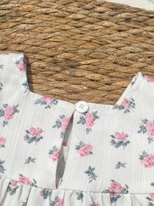 SHEIN Bộ áo liền quần họa tiết hoa nhí cho bé gái, chất liệu mềm mại và thoải mái, kiểu dáng công chúa ngọt ngào và dễ thương, thích hợp cho các hoạt động thường ngày mùa xuân/hè, du lịch, công viên, dã ngoại, chụp ảnh. - trắng - Xem 5