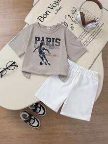SHEIN Bộ đồ thể thao thường ngày 2 món cho bé trai, gồm áo thun ngắn tay rộng rãi và quần short có dây rút, in chữ "PARIS" và họa tiết bóng đá, thoải mái và đơn giản, thích hợp cho hoạt động thể thao ngoài trời mùa hè. - Xám - Xem 8