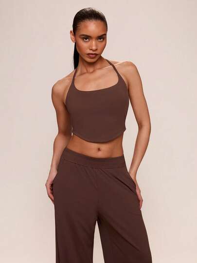 SHEIN BAE Solid Color Backless Halter Cropped Activewear Top