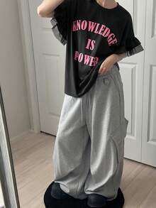 FRIFUL Women's Round Neck Sleeveless Loose T-Shirt With Bright Color Letter Print, Mesh Splice And Ruffle Trim Graphic Tees Women Summer - Black - View 2