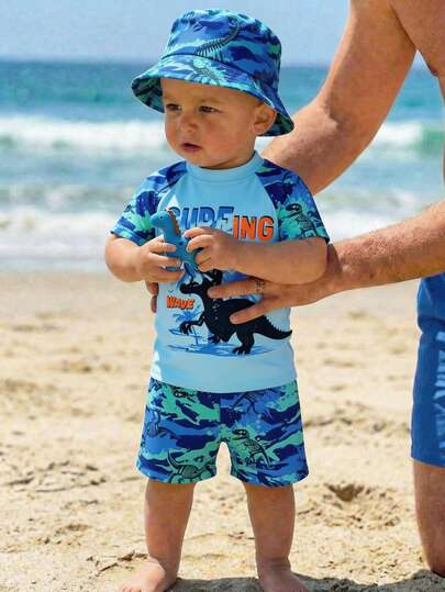 SHEIN Baby Boy Classic Fashion Casual Vacation Style Coconut Tree, Tropical Plant, Dinosaur Pattern, Camouflage Print Short Sleeve T-Shirt And Shorts Swimsuit Set, Suitable For Summer, Beach, Vacation, Swimming