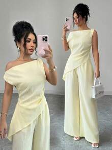 Elenzga 浅黄色波浪纹理面料，高端设计，不对称肩部，收腰，不规则下摆上衣搭配宽松直筒裤，优雅精致，适合情人节、复活节、劳动节、生日、约会、派对、正式场合、教师装、旅行、街头风等各种场合，春夏两件套。 - 淡黃色 - 查看 1