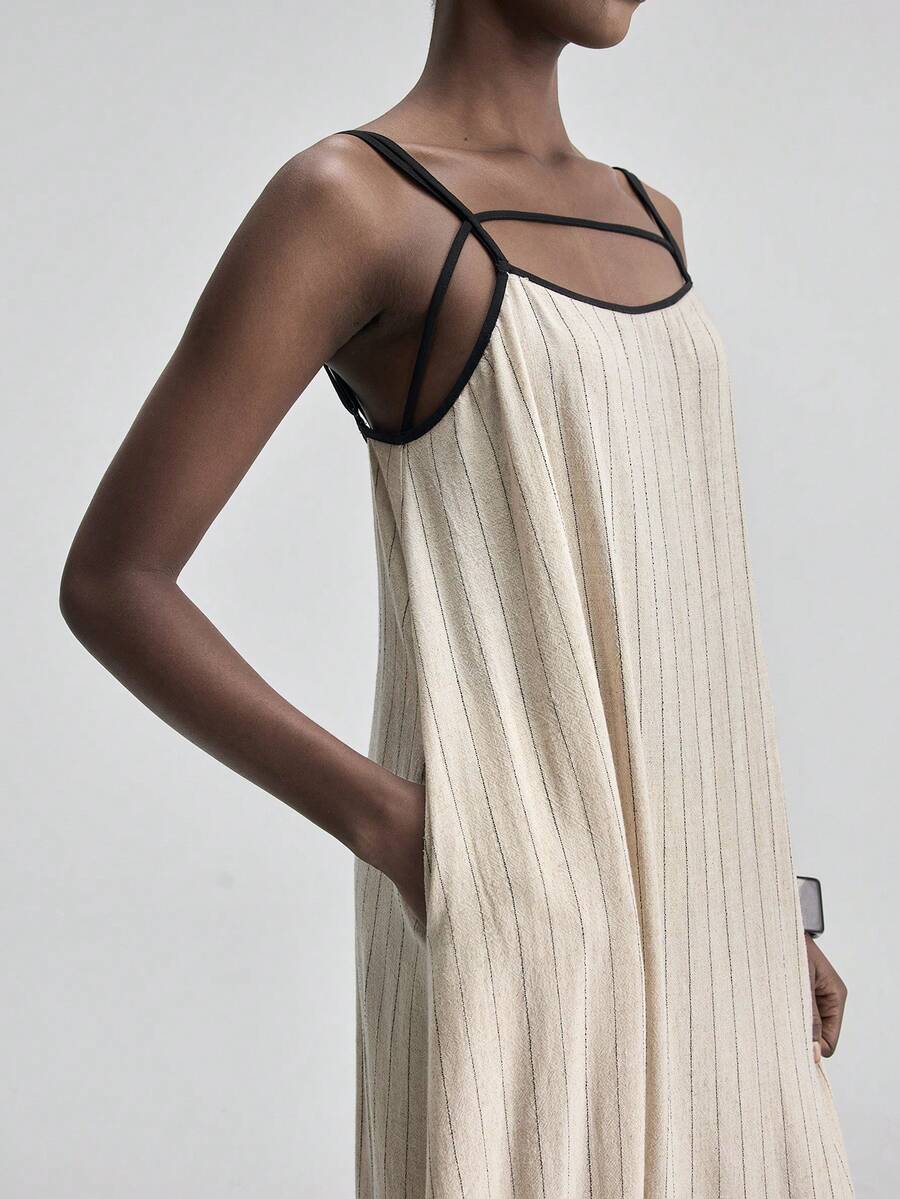 Ontre Đầm hai dây kẻ sọc mới mùa hè 2026 với dây thắt eo, kiểu dáng đa năng, phù hợp cho việc đi làm trong thành phố, đi nghỉ mát, đi biển, tham dự lễ hội âm nhạc vào mùa xuân và mùa hè. - Nhiều màu - Xem 1