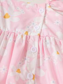 SHEIN Đầm xòe không tay màu hồng mùa hè cho bé gái. Thiết kế cài khuy bên hông đầy tinh nghịch. Băng đô nơ cùng màu. Họa tiết hoa toàn thân vui nhộn và dễ thương với màu sắc nhẹ nhàng. Thích hợp cho những buổi đi chơi hàng ngày. Trang phục cho bé gái. Ootd (trang phục thường ngày). - Hồng - Xem 6