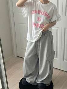 FRIFUL Damen Rundhals-Ärmellos Loose T-Shirt mit Bunt Buchstaben Muster, Mesh Einsatz und Rüschen Saum Grafik Tees für Frauen - Weiss - Übersicht 2
