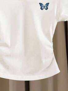 Áo polo tay ngắn dáng lửng màu trơn cho bé gái tuổi teen, cổ chữ V, ôm sát, có nhún bèo bên hông, họa tiết bướm dễ thương cổ điển. - Nhiều màu - Xem 5