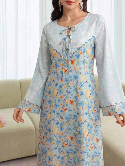 Yasmyna Đầm kiểu Ả Rập dáng rộng, cổ buộc dây, eo thắt, in hoa.