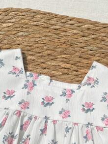 SHEIN Bộ áo liền quần họa tiết hoa nhí cho bé gái, chất liệu mềm mại và thoải mái, kiểu dáng công chúa ngọt ngào và dễ thương, thích hợp cho các hoạt động thường ngày mùa xuân/hè, du lịch, công viên, dã ngoại, chụp ảnh. - trắng - Xem 3