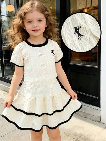 Genkimix Kids Bộ áo thun dệt kim cổ tròn tay ngắn thêu họa tiết và chân váy xòe dễ thương cho bé gái, thích hợp cho mặc hàng ngày, kỳ nghỉ hè mát mẻ, đi biển, dã ngoại. Trang phục ngọt ngào đáng yêu.