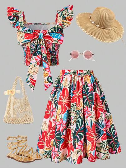 SHEIN Con elementos vibrantes de estampados florales tropicales y de leopardo, este vestido cuenta con un escote cuadrado con mangas con volantes y vuelo para un aspecto alegre y dinámico. La espalda presenta un diseño de lazo y cintura elástica, que favorece la figura y le da un toque vintage. La falda ligera y fluida irradia un ambiente de vacaciones de verano, apasionado y despreocupado pero dulcemente femenino, perfecto para salidas casuales o entornos de playa.