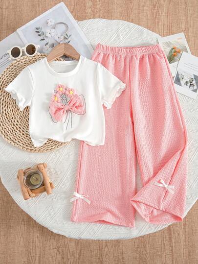SHEIN Vintaside Kids Bộ đồ 2 món cho bé gái: Áo thun ngắn tay màu trắng + Quần ống rộng màu hồng có họa tiết hoa và nơ 3D, thích hợp mặc hàng ngày và đi nghỉ mát, mùa hè.