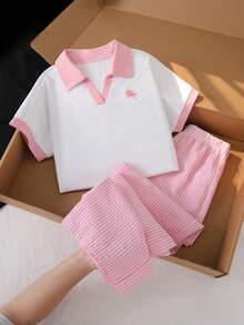 Bộ đồ thường ngày đa năng cho bé gái tuổi teen, màu đen trắng phối viền tương phản, gồm áo thun cổ tròn tay raglan và quần dài ống đứng bằng vải dệt kim. - Hồng - Xem 1