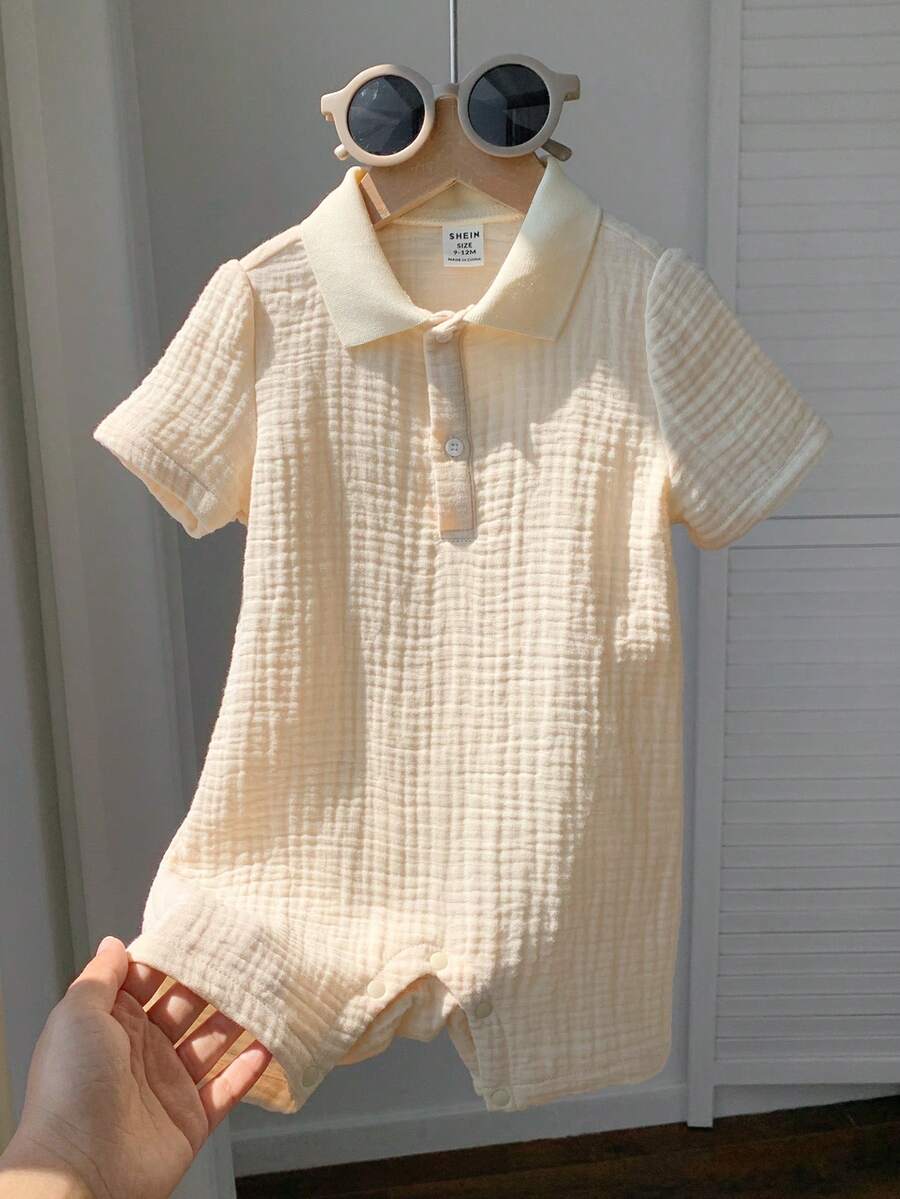 SHEIN 男婴/女婴休闲日常柔软舒适提花面料POLO领短袖半拉链连体短裤，适合度假、居家、外出、春夏穿着。