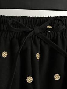 GlowEve 新款时尚夏季度假休闲法式波点短裤，带口袋、松紧腰带和蝴蝶结，女士款 - 黑色 - 查看 4