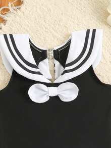 SHEIN Bộ áo tắm liền thân và váy cho bé gái, phối họa tiết nơ, thích hợp cho kỳ nghỉ biển, tiệc bể bơi, tiệc bãi biển. - Đen và trắng - Xem 3
