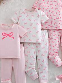 Genkimix Kids Bộ đồ ngủ ngắn tay ôm sát 6 món cho bé gái, in hình nơ và trái tim, co giãn, có thể giặt máy, thoải mái khi mặc, 3 bộ bán riêng lẻ. - Hồng - Xem 7