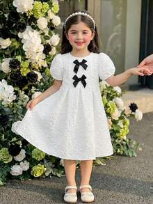 Elladie kids 春夏新款女童优雅公主A字伞裙，提花云朵花卉图案，可爱泡泡袖，黑色蝴蝶结点缀，适合婚礼派对穿着 - 白色 - 查看 6
