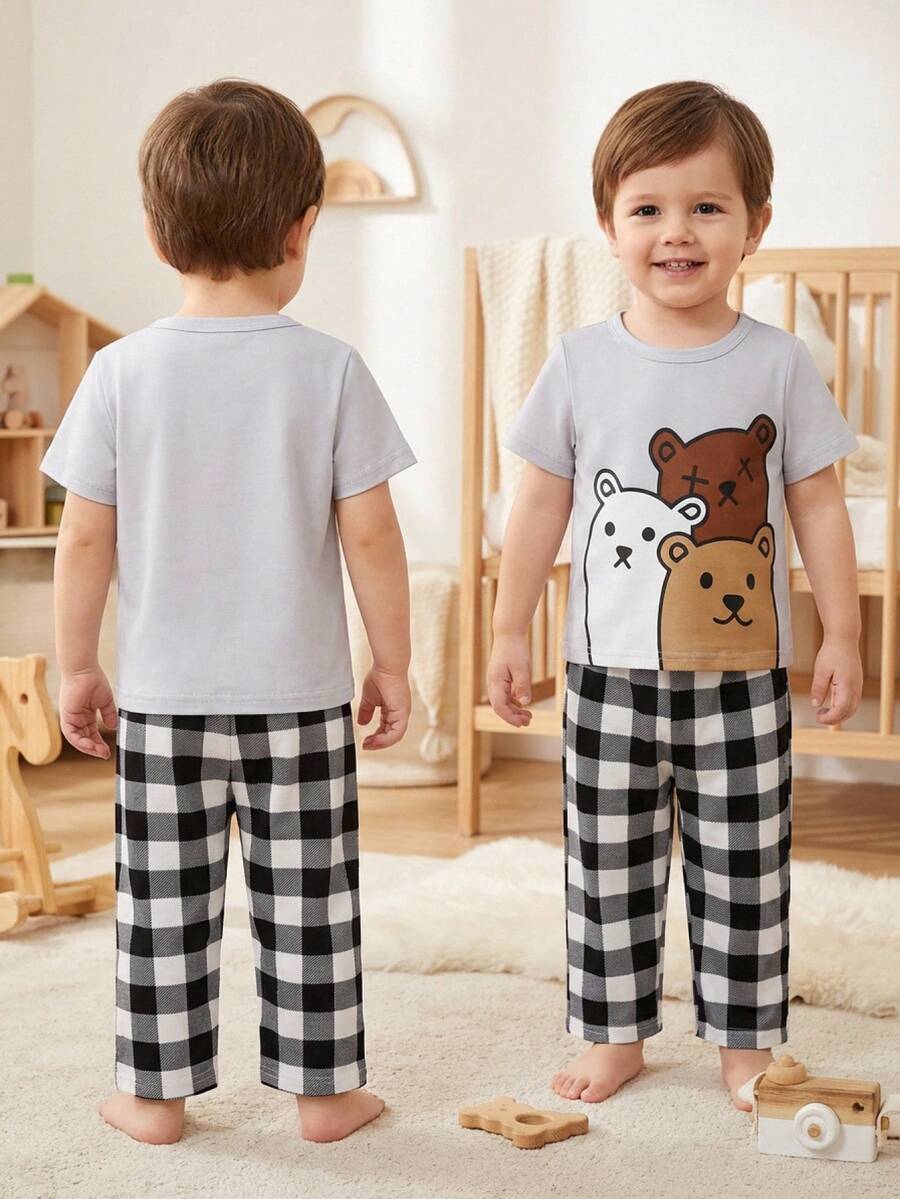 SHEIN Baby Boy Cute Cartoon Penguin Print Round Neck Short Sleeve T-Shirt And Plaid Pattern Loose Casual Pajama Pants 2pcs Set