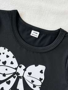 SHEIN Vintaside Kids 两件套可爱女童休闲短袖上衣和长裤套装，饰有心形蝴蝶结印花，可爱时尚，适合春夏户外活动、度假、日常穿着和旅行。 - 黑色 - 查看 6